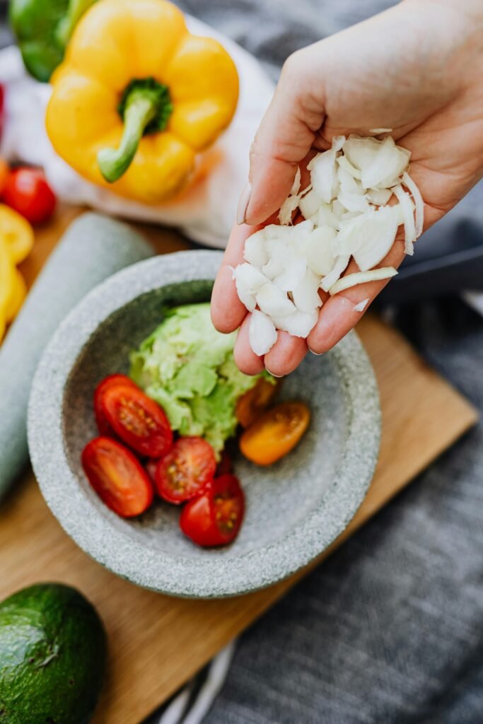 Making a traditional Spanish salsa with a pestle and mortar